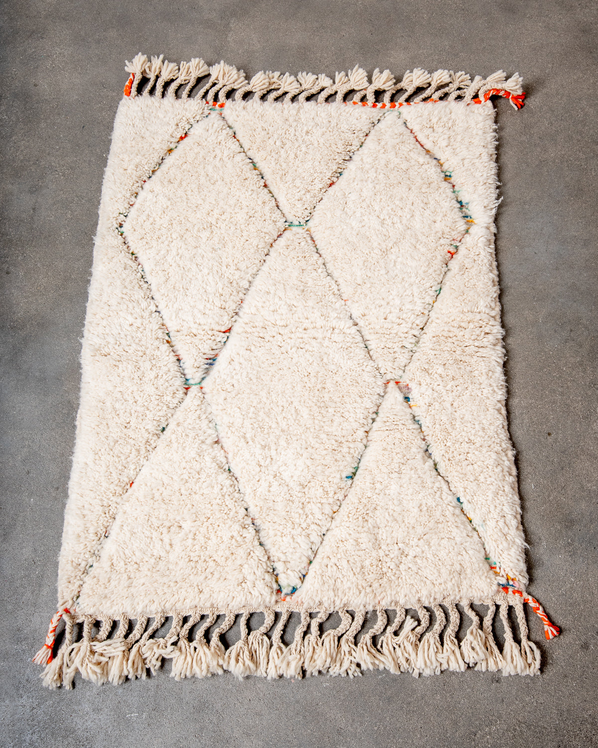 Modern, designer, handcrafted Berber rug from Morocco. Beniourain carpet with beautiful colours and patterns and fluffy wool texture.